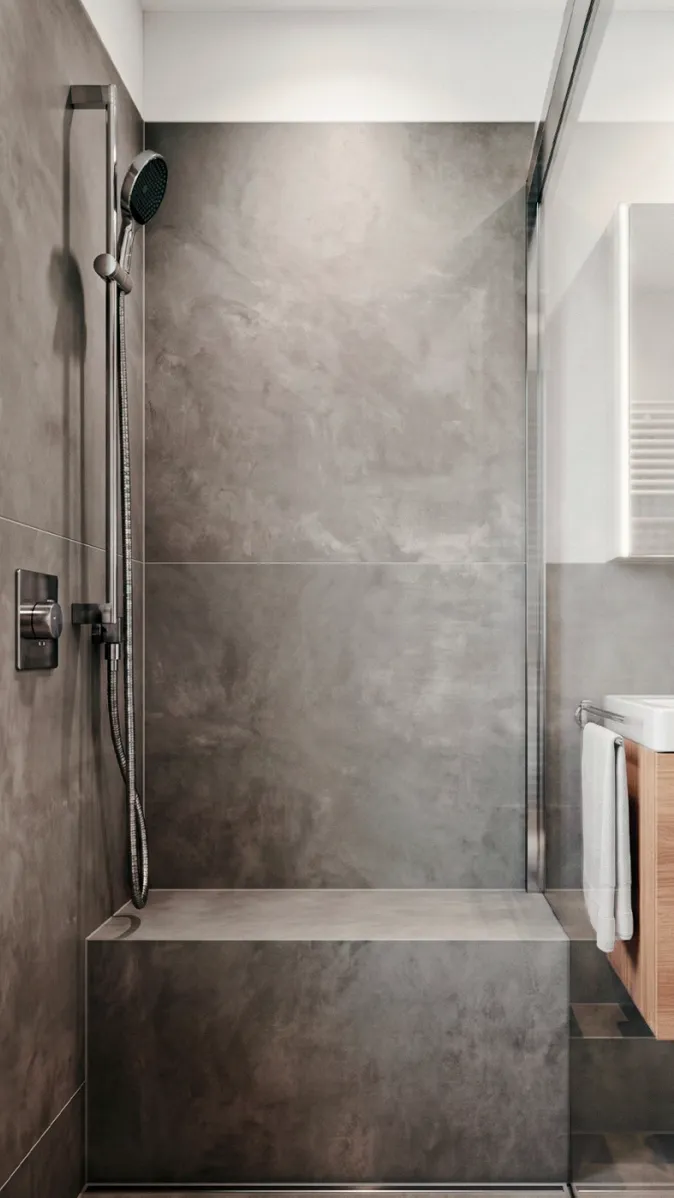 Bodengleiche Dusche mit Glasabtrennung und Sitzbank